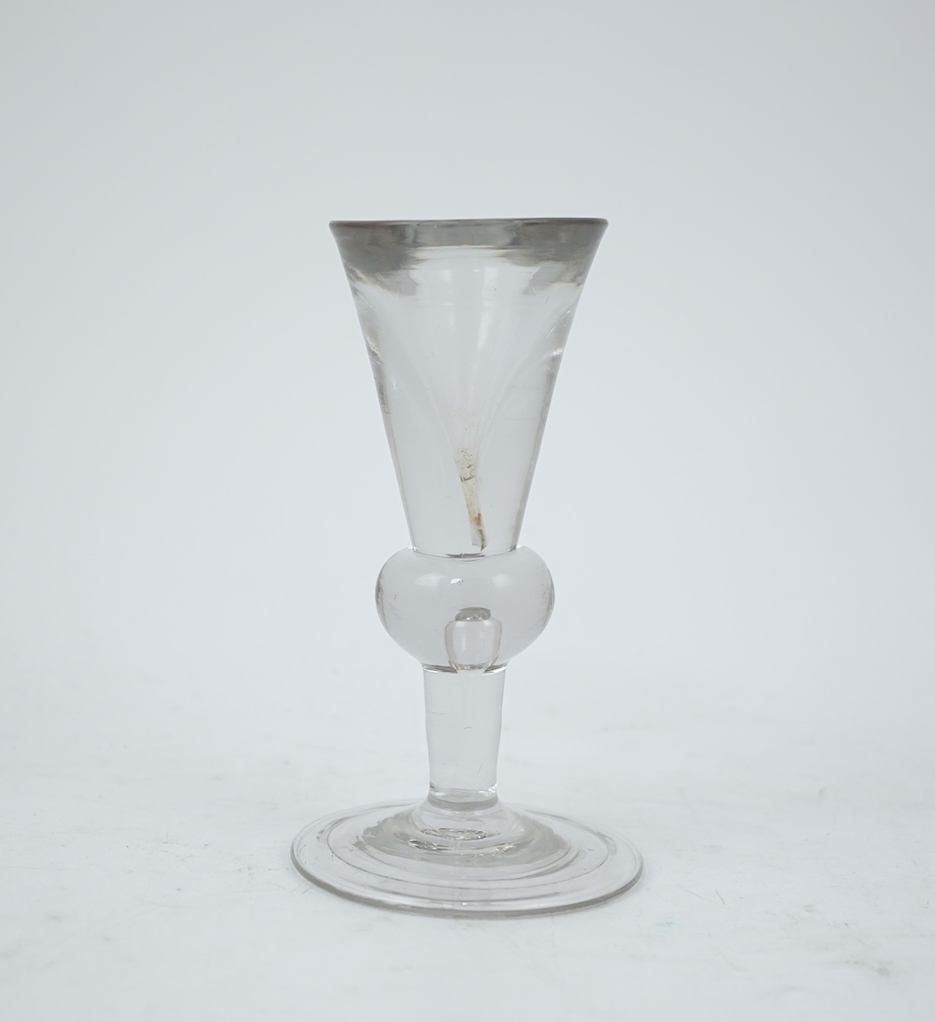 A heavy baluster toastmaster's glass, circa 1715-1720